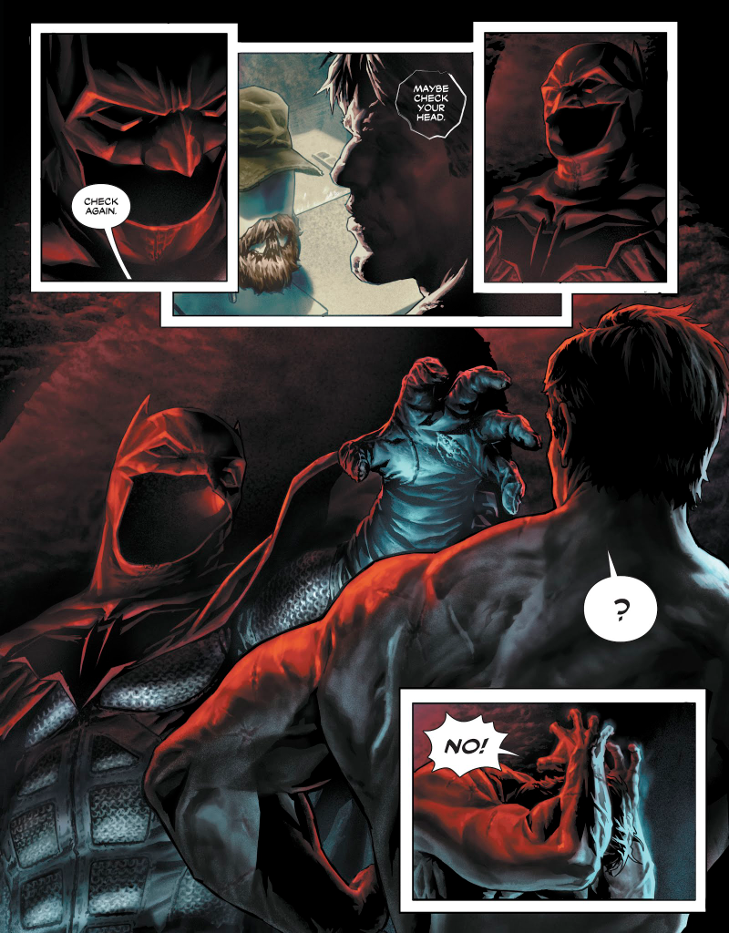 Bruce being attacked by an empty Batman suit.